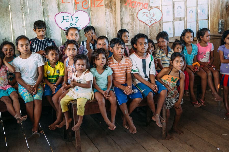 Visit indigenous Amazonia children - Aqua Expeditions