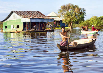 Tonle Sap Cambodia Man Boat